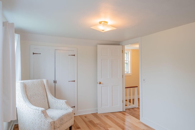228 Atlantic Ave, Boothbay Harbor, ME 04538 - living area with light wood-style floors and baseboards