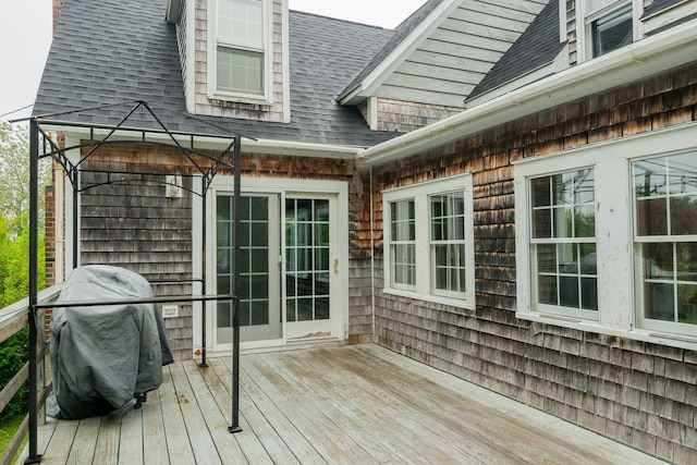 228 Atlantic Ave, Boothbay Harbor, ME 04538 - wooden terrace with a grill