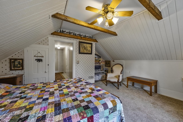 carpeted bedroom featuring vaulted ceiling, baseboards, and ceiling fan