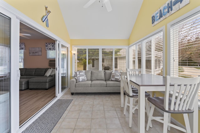 sunroom / solarium featuring a ceiling fan and a healthy amount of sunlight
