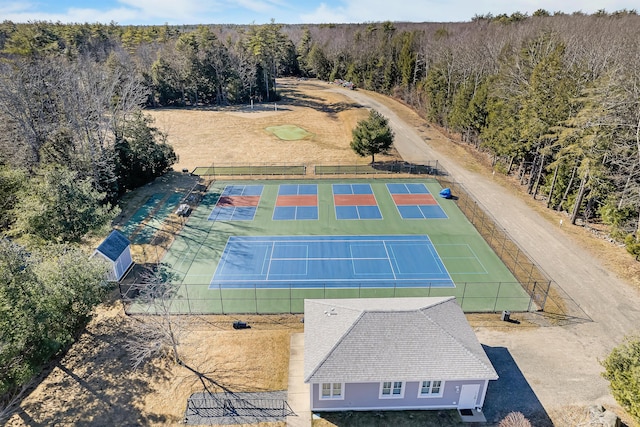 aerial view featuring a wooded view