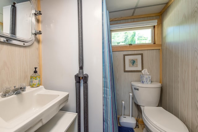 43 W Shore Rd, Harpswell, ME 04003 - bathroom with a paneled ceiling, toilet, and a sink
