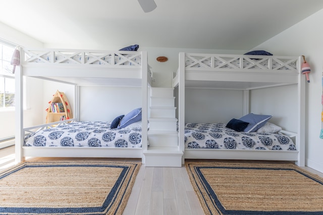 bedroom featuring a ceiling fan and wood finished floors