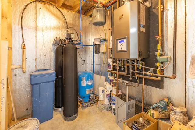 utility room featuring water heater