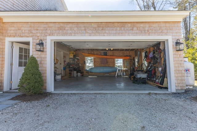 garage featuring driveway
