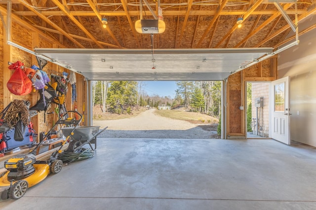 garage featuring a garage door opener