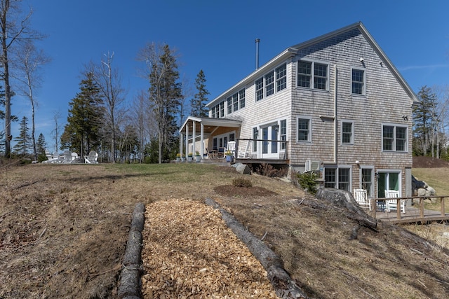 view of home's exterior with a deck