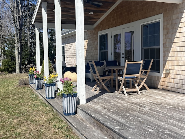 deck featuring french doors and outdoor dining space