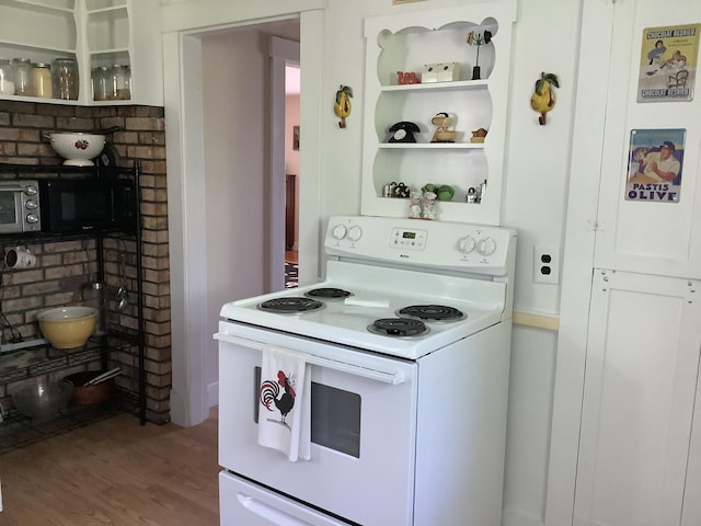 kitchen with open shelves, wood finished floors, white cabinets, and electric range