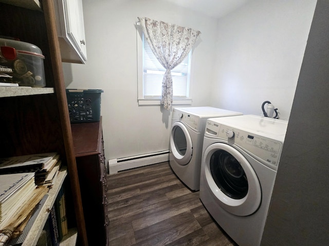 laundry room with a baseboard heating unit, cabinet space, dark wood-style floors, and independent washer and dryer