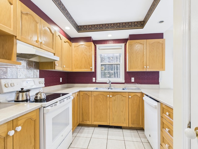 274 19th Ave, Madawaska, ME 04756 - kitchen with a sink, decorative backsplash, white appliances, under cabinet range hood, and light tile patterned floors
