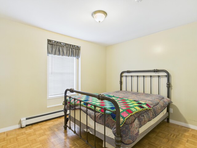274 19th Ave, Madawaska, ME 04756 - bedroom with baseboard heating and baseboards