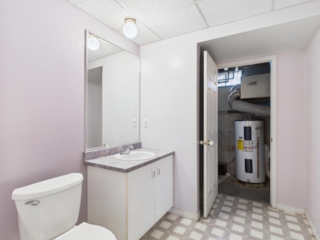 274 19th Ave, Madawaska, ME 04756 - half bath featuring water heater, toilet, vanity, and tile patterned floors
