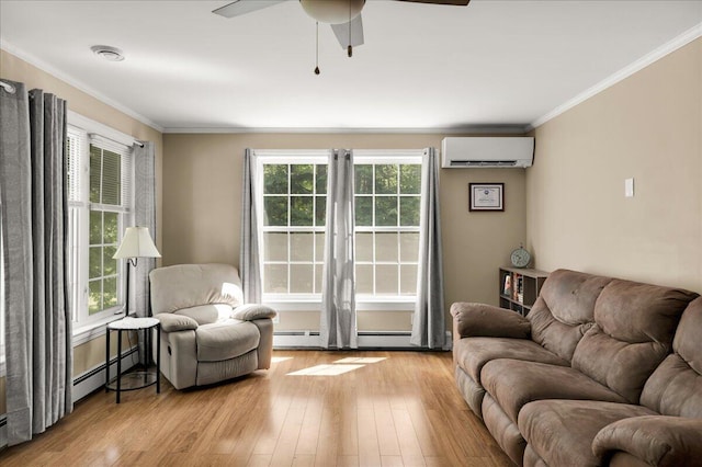 95 The Woods Rd, Union, ME 04862 - living area with a wall mounted AC, ceiling fan, light wood-style flooring, crown molding, and a baseboard heating unit