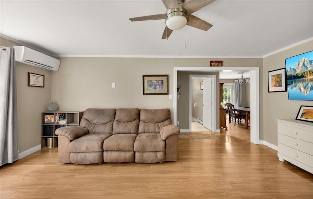 95 The Woods Rd, Union, ME 04862 - living area featuring an AC wall unit, crown molding, light wood-type flooring, ceiling fan, and a chandelier