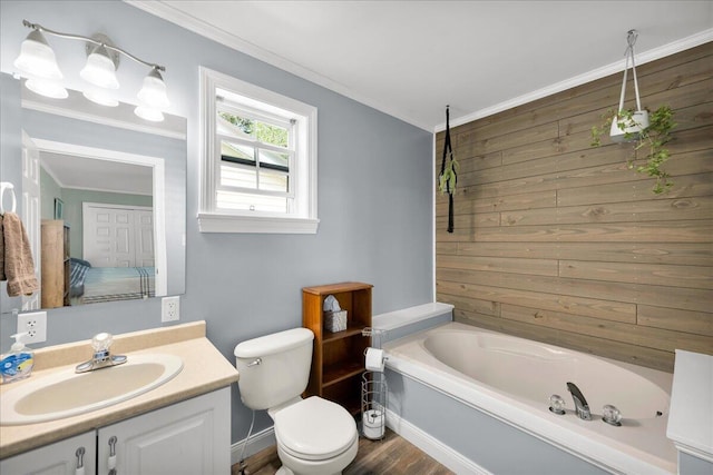 95 The Woods Rd, Union, ME 04862 - bathroom featuring a tub to relax in, vanity, crown molding, wood finished floors, and wooden walls