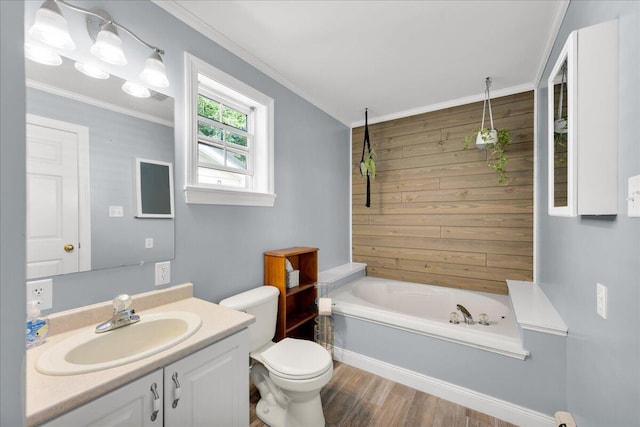 95 The Woods Rd, Union, ME 04862 - bathroom featuring a tub, vanity, crown molding, wood finished floors, and wooden walls