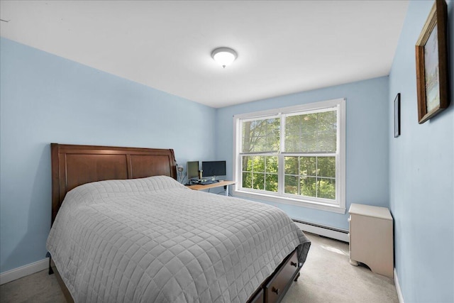 95 The Woods Rd, Union, ME 04862 - bedroom featuring a baseboard radiator and light colored carpet