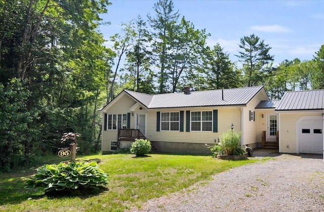 95 The Woods Rd, Union, ME 04862 - ranch-style home featuring driveway, an attached garage, a metal roof, crawl space, and a front yard