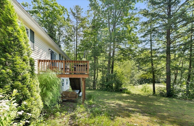 95 The Woods Rd, Union, ME 04862 - view of green lawn featuring a deck