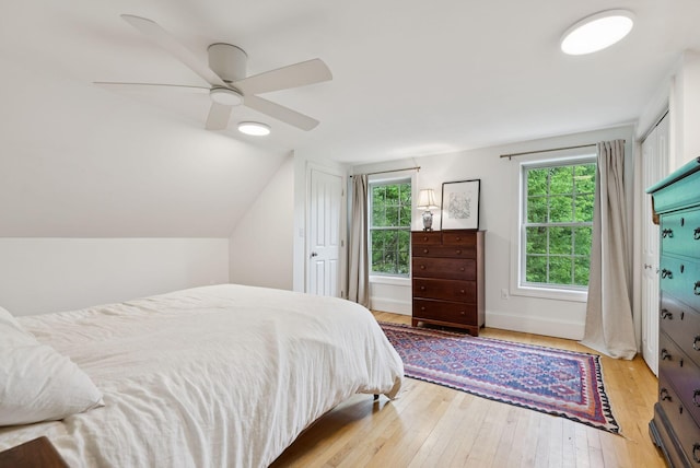 1228 Long Plains Rd, Buxton, ME 04093 - bedroom with hardwood / wood-style floors, ceiling fan, and lofted ceiling