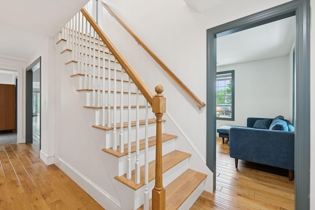 1228 Long Plains Rd, Buxton, ME 04093 - stairway with hardwood / wood-style floors and baseboards