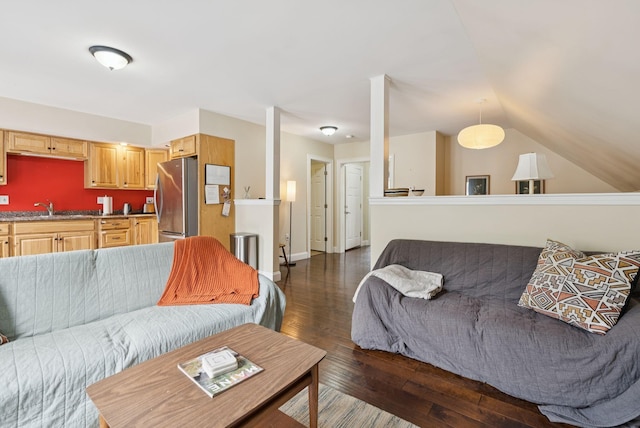 1228 Long Plains Rd, Buxton, ME 04093 - living area featuring dark wood finished floors and vaulted ceiling