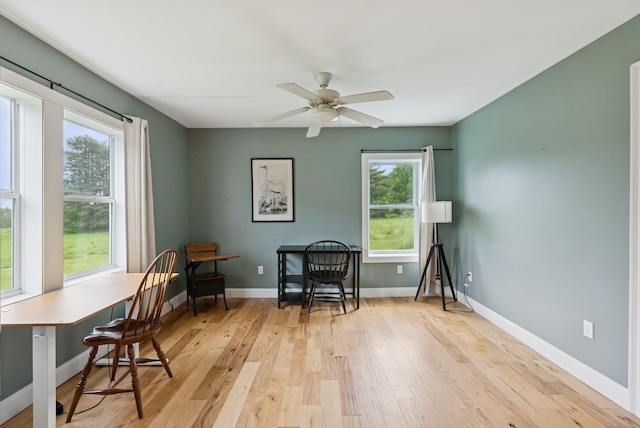 1228 Long Plains Rd, Buxton, ME 04093 - home office with plenty of natural light, light wood-style floors, and ceiling fan