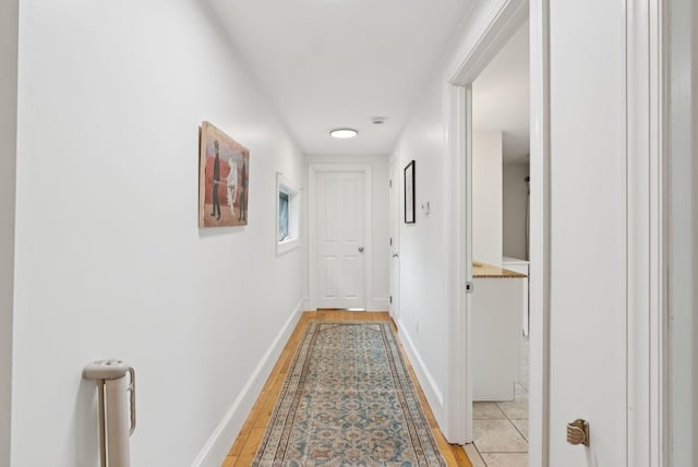 1228 Long Plains Rd, Buxton, ME 04093 - hall with light wood-type flooring and baseboards