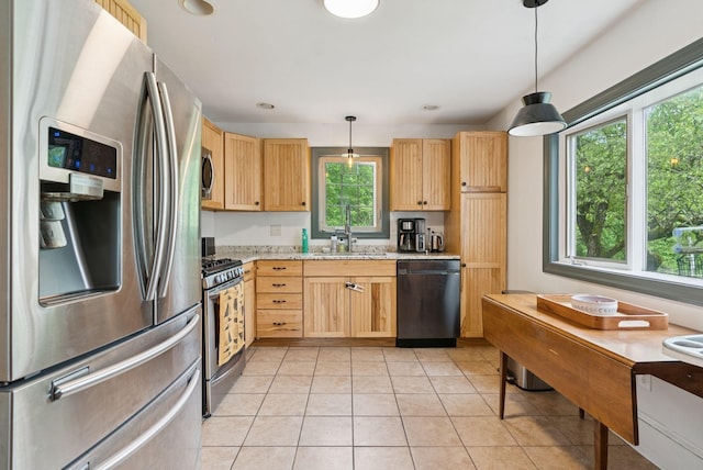 1228 Long Plains Rd, Buxton, ME 04093 - kitchen with appliances with stainless steel finishes, light brown cabinetry, light tile patterned floors, decorative light fixtures, and recessed lighting