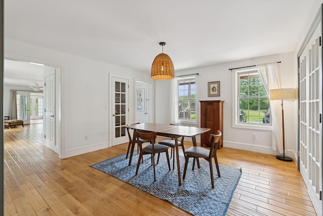 1228 Long Plains Rd, Buxton, ME 04093 - dining space with french doors and light wood-type flooring