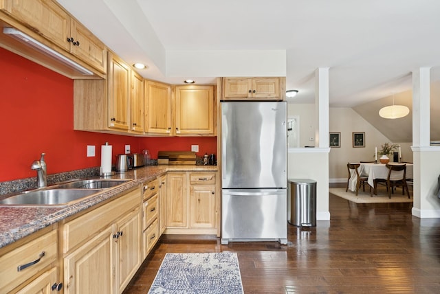 1228 Long Plains Rd, Buxton, ME 04093 - kitchen with freestanding refrigerator, light brown cabinets, dark wood-style flooring, lofted ceiling, and recessed lighting