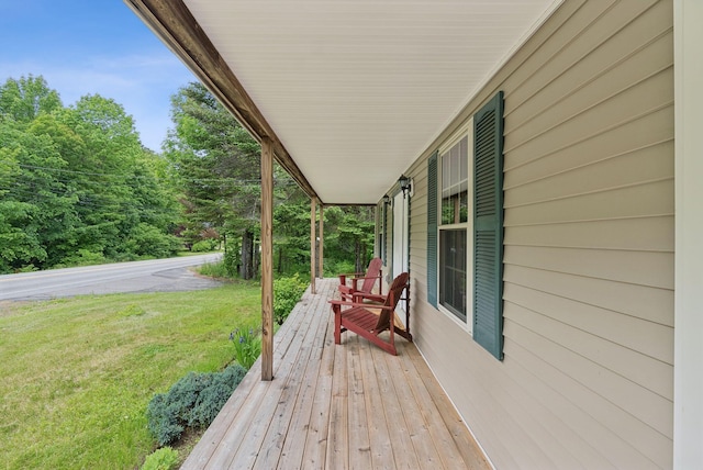 1228 Long Plains Rd, Buxton, ME 04093 - wooden porch with a yard
