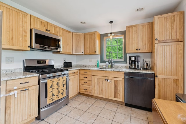 1228 Long Plains Rd, Buxton, ME 04093 - kitchen featuring stainless steel appliances, light brown cabinetry, light tile patterned floors, light stone counters, and recessed lighting