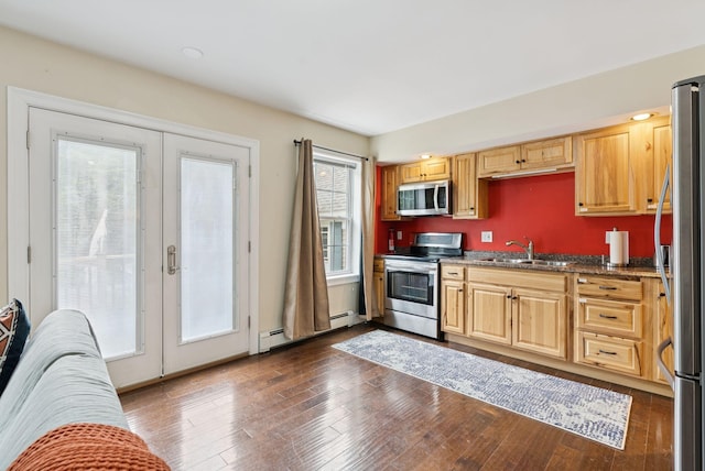 1228 Long Plains Rd, Buxton, ME 04093 - kitchen with stainless steel appliances, a baseboard radiator, dark wood-style floors, and french doors