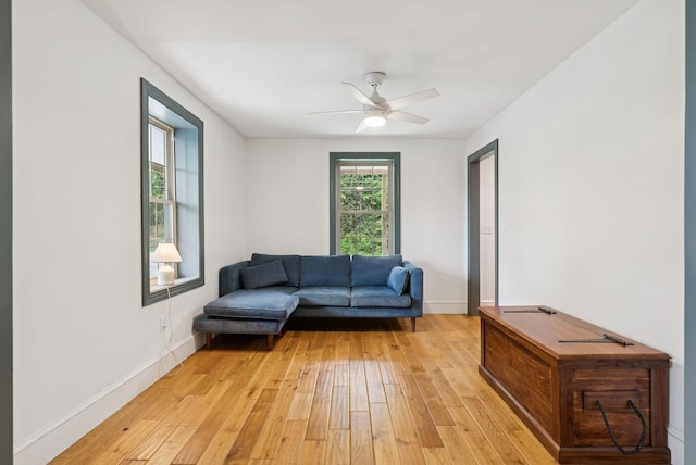 1228 Long Plains Rd, Buxton, ME 04093 - sitting room with light wood-type flooring and ceiling fan