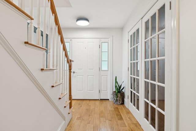 1228 Long Plains Rd, Buxton, ME 04093 - doorway to outside with light wood-style floors, stairs, and french doors