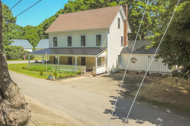 34 Harbor Rd, Friendship, ME 04547 - view of front facade featuring a chimney and covered porch