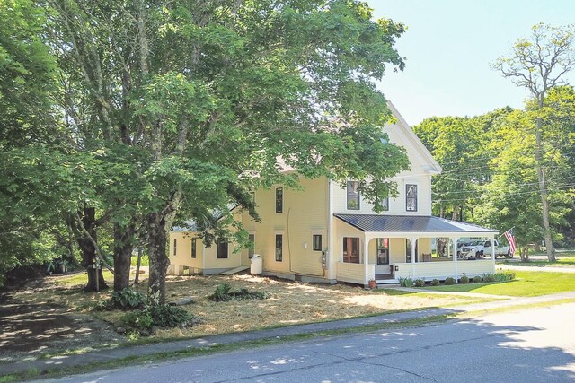 34 Harbor Rd, Friendship, ME 04547 - view of front of home with a porch, a standing seam roof, and metal roof