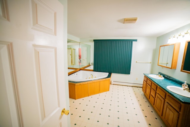 bathroom featuring a sink, tile patterned floors, a baseboard radiator, and double vanity
