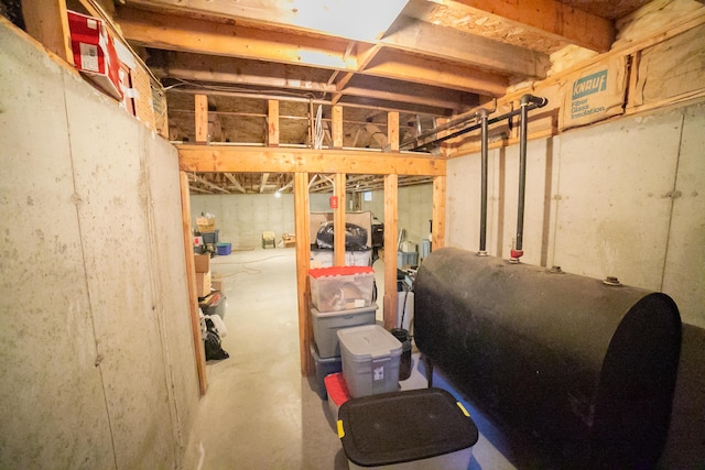 unfinished below grade area featuring heating fuel