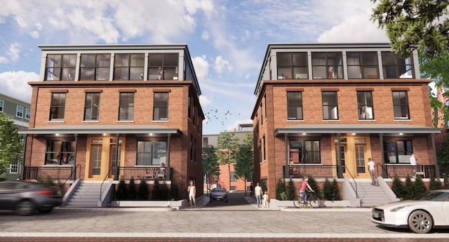 51 Carleton St Unit B, Portland, ME 04102 - view of front facade with stairs, a porch, and brick siding