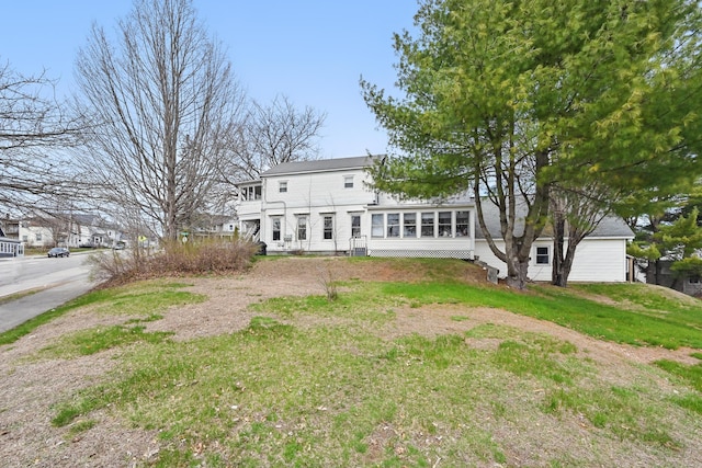 107 Northern Ave, Augusta, ME 04330 - back of house featuring a lawn