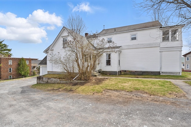 107 Northern Ave, Augusta, ME 04330 - back of house with a chimney and driveway