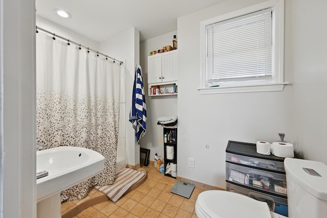 107 Northern Ave, Augusta, ME 04330 - bathroom featuring tile patterned floors, baseboards, toilet, and curtained shower