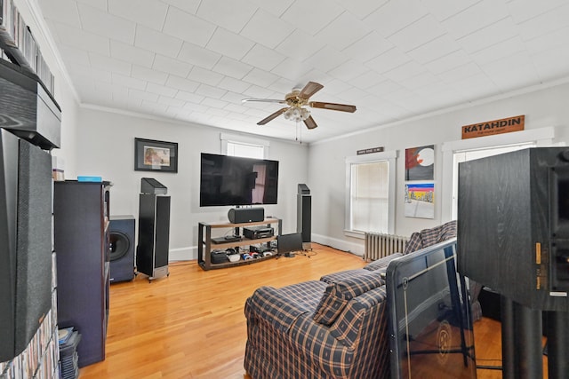 107 Northern Ave, Augusta, ME 04330 - living room with baseboards, ornamental molding, a ceiling fan, and wood finished floors