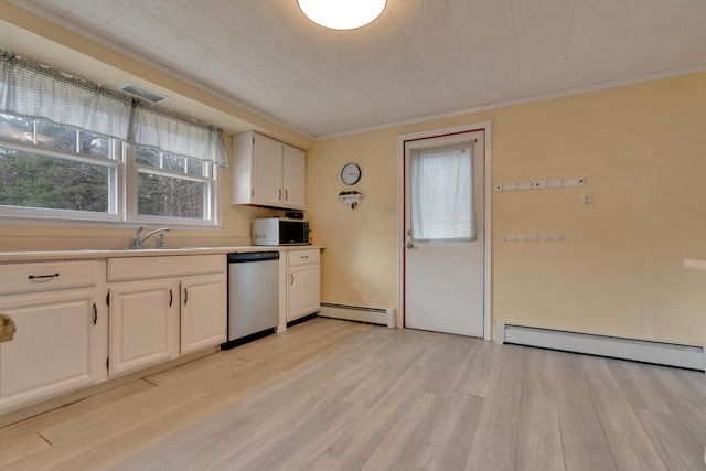 99 Ocean Park Rd, Saco, ME 04072 - kitchen featuring white cabinets, light countertops, stainless steel dishwasher, light wood-type flooring, and a baseboard radiator