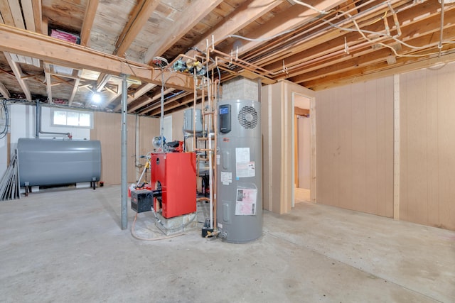 99 Ocean Park Rd, Saco, ME 04072 - below grade area featuring heat pump water heater, a heating unit, wooden walls, and heating fuel
