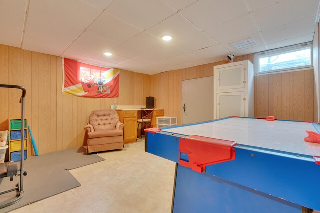 99 Ocean Park Rd, Saco, ME 04072 - rec room featuring wood walls, a drop ceiling, and tile patterned floors
