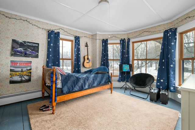 bedroom with a baseboard radiator, ornamental molding, wood finished floors, and wallpapered walls